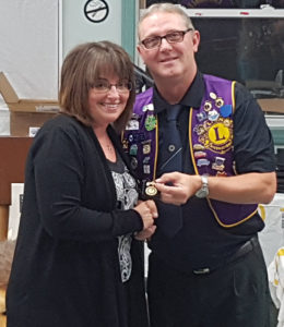 Community volunteer Shelley Samson accepts a Special Merit Award for her involvement and dedication to the Church Youth Music Ministry Program.