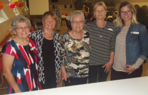 Among the 45 people joining in the fun at last week’s 10th-anniversary celebrations for the Adult Drop In group that meets Wednesday afternoons at St. Peter’s Lions’ Hall were (from the left):  volunteers Marie Burkey, Marie Kemp, Bertha Martell and Alice Frost, as well as Tiffany Peeples, primary health care coordinator for the Nova Scotia Health Authority. 