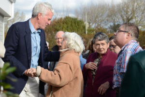 Councillor Jim Mustard greets visitors to the Inverness Community Leadership Centre.