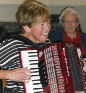 Photo by Cathy Cooke Accordion player Helen Oram of Hudson, Massachusetts fired up the Celtic Colours “Causeway Song Session” in Port Hastings with some of her favourite Newfoundland songs, including “I’se The By” and “Mussels In The Corner.” 