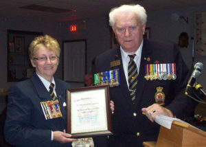 Ladies auxiliary president Vivian Short (right) accepted a Certificate of Recognition from Cape Breton District A presented by District Commander Ted Martens.