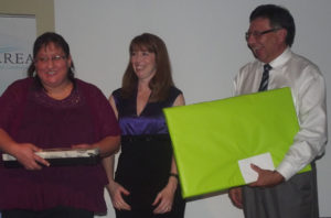 Norma Gould (left), president of the Mawita’mk Society and a member of the Strait Area Chamber of Commerce board of directors, joined chamber executive director Amanda Mombourquette in thanking Dan Christmas for delivering the keynote address at the chamber’s Fall Awards Dinner on November 17. 