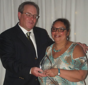 Strait Area Chamber of Commerce president David Hart presented the chamber’s Outstanding Customer Service Award to Nova Scotia Community College (NSCC) Marine Administrative Assistant Wilma Greencorn, during the chamber’s November 17 Fall Awards Dinner at the Port Hawkesbury Civic Centre. 