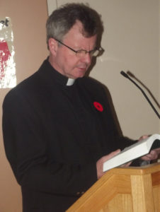 St. Paul’s Parish Priest, Father Allan MacPhie, delivered a reading from the third chapter of The Book of Ecclesiastes during the opening minutes of this year’s Remembrance Ceremony at the Havre Boucher Community Centre. Father MacPhie later returned to offer the event’s closing benediction and blessing. 
