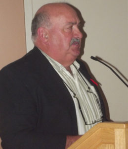 Havre Boucher Veterans Association representative Brian Melong read the first round of names for the wreath presentations that took place at the Havre Boucher Community Centre Sunday afternoon as part of the community’s annual Remembrance Ceremony. 